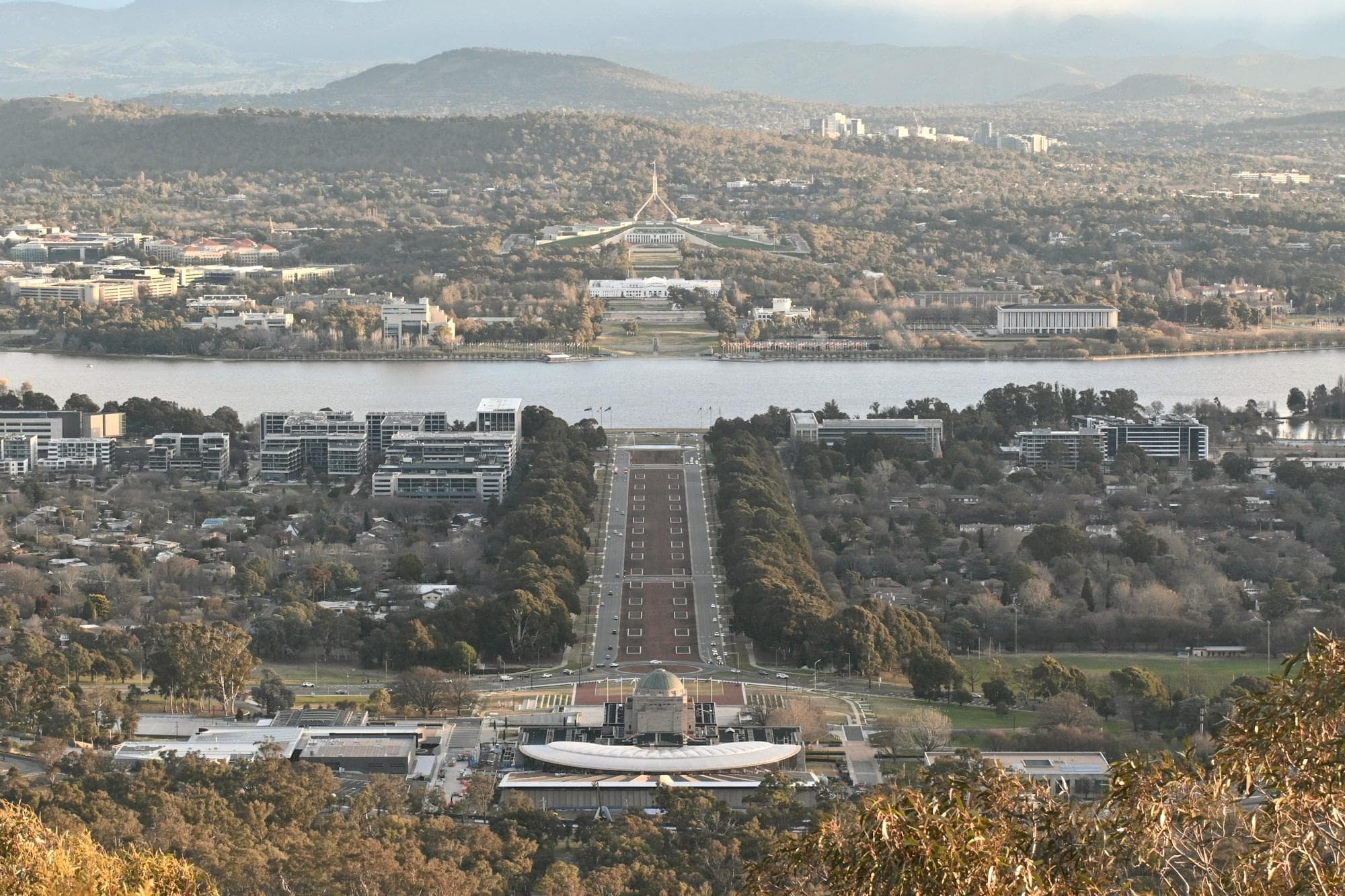View from Mount Ainslie down Anzac Parade, across Lake Burley Griffin to Parliament House