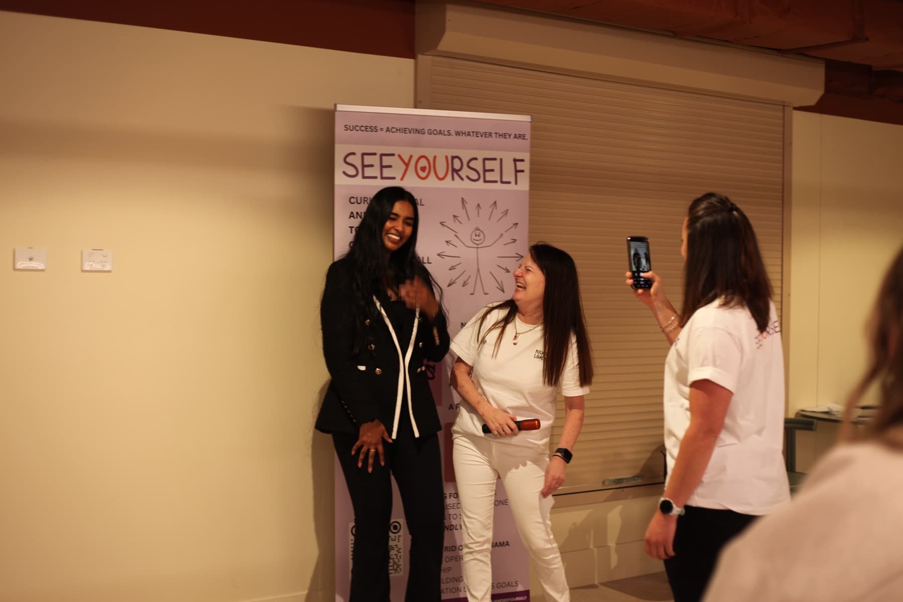 Guests taking photos at a community event